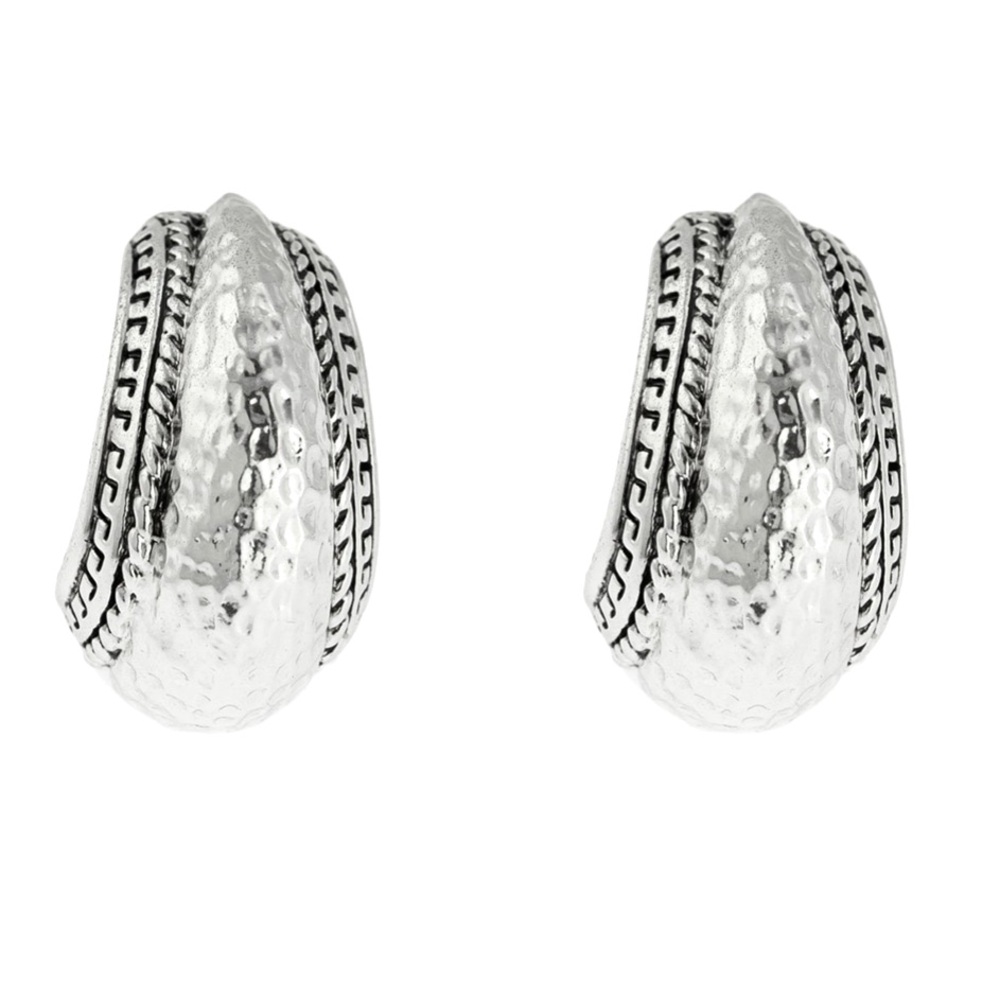 Vintage Oscar de la Renta Clip- on earrings. Silver hammered hoops